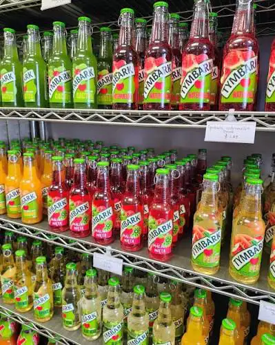 Tymbark bottles on store shelves